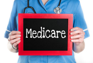 Don't get caught in the Medicare Death spiral _ doctor holding sign